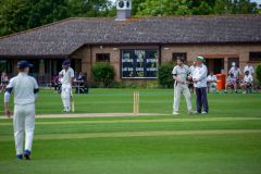Danny-Clark-with-the-pavilion-behind-him