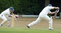Warick-Bradfield-takes-one-behind-the-stumps