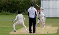 Mark-Usher-lifts-one-over-the-off