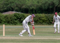 Kishan-Dave-watches-it-onto-the-bat